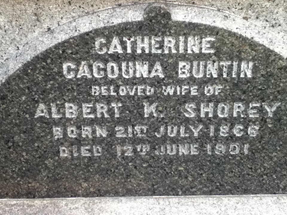 Close-up of a grey tombstone.