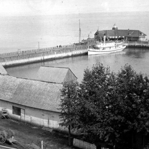 A wharf extending into the river.